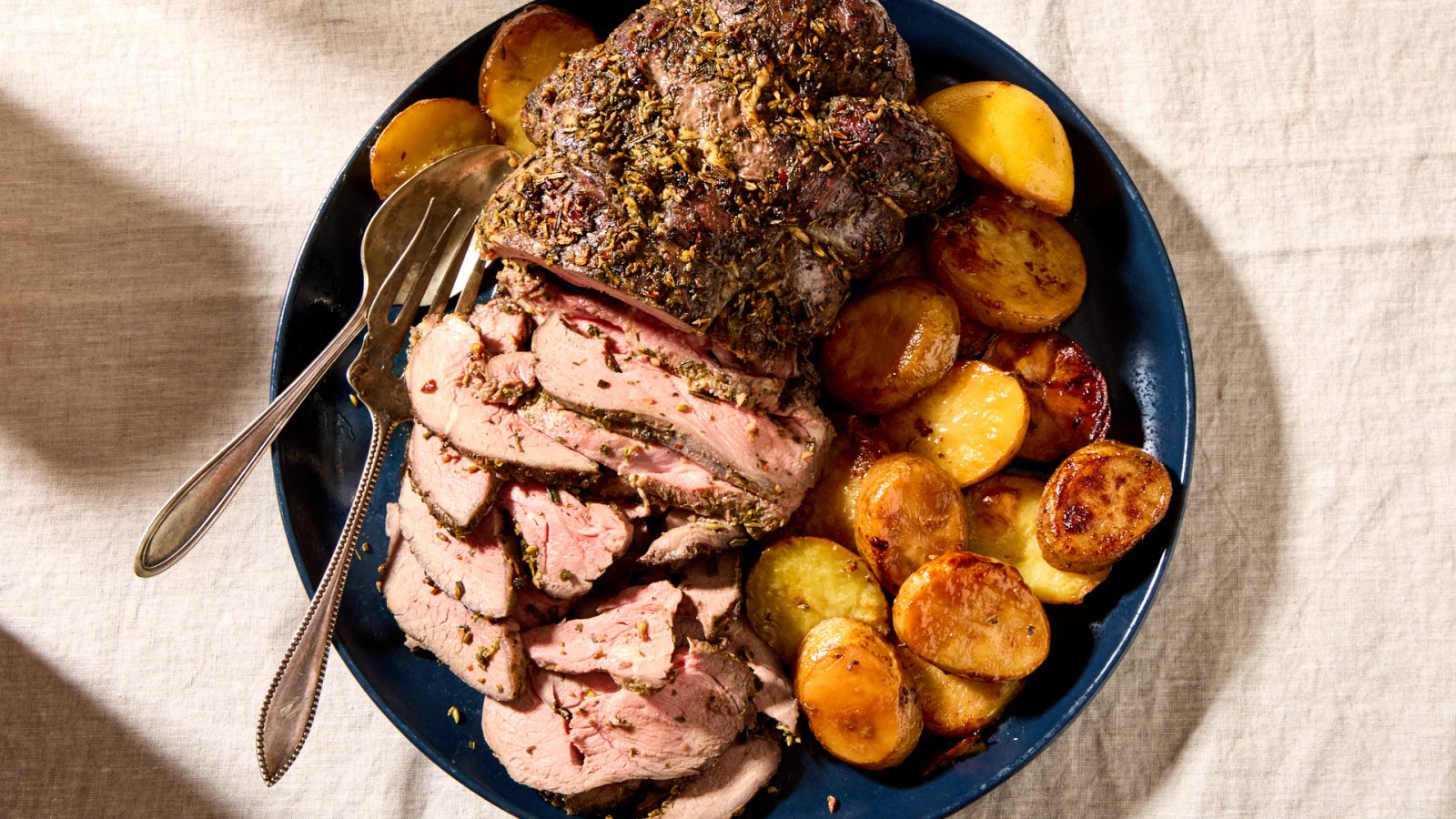 Reverse Sear Leg of Lamb with Garlic Fennel and Herbs