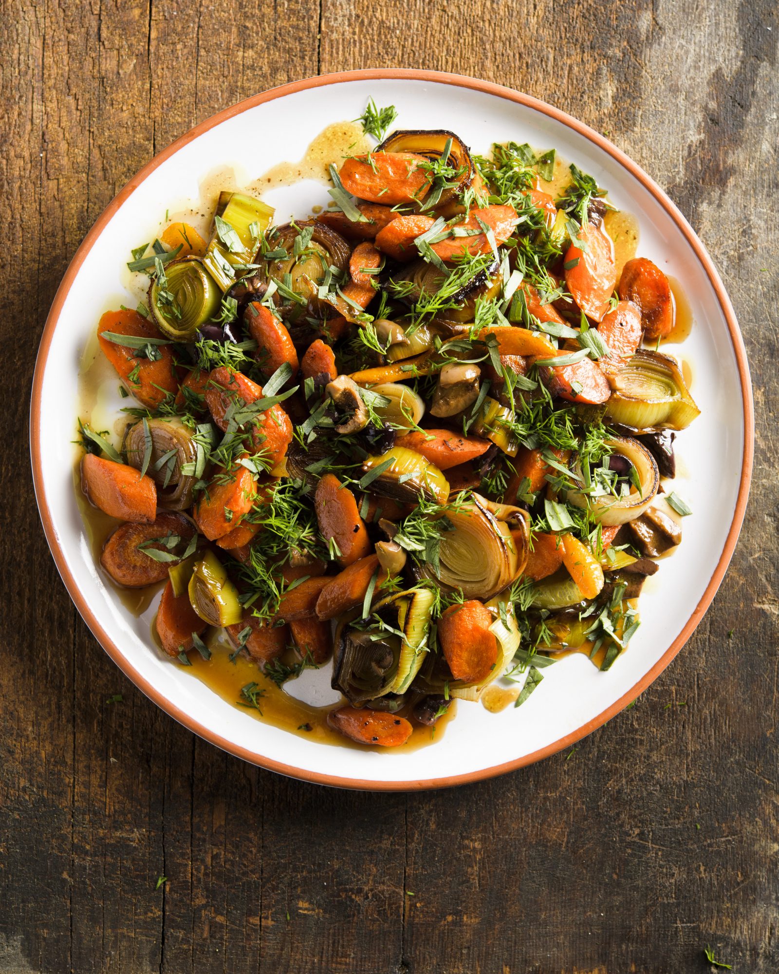 Braised carrots leeks olives herbs v