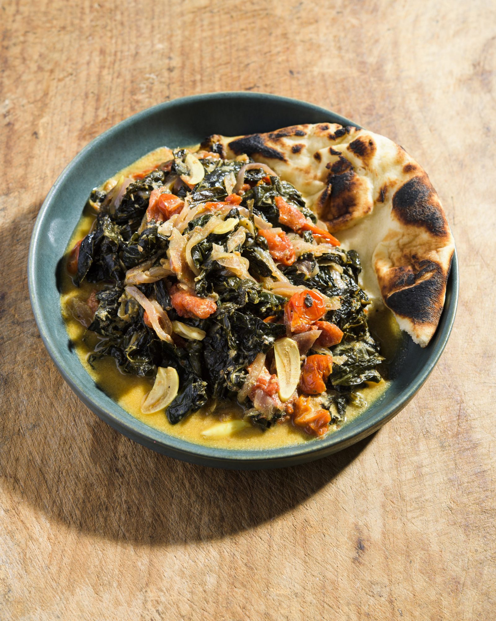 Curried braised kale tomatoes yogurt v