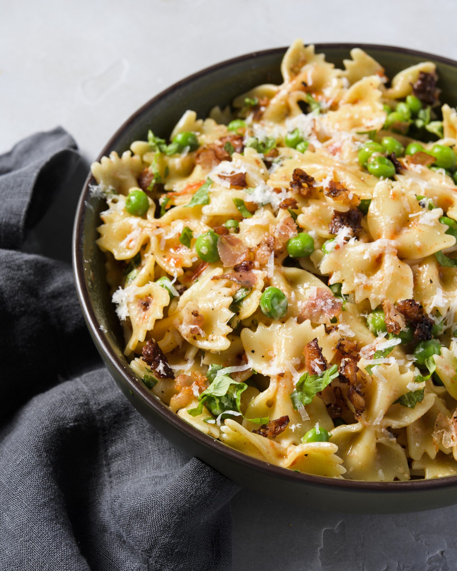 Farfalle tomatoes peas pecorino v