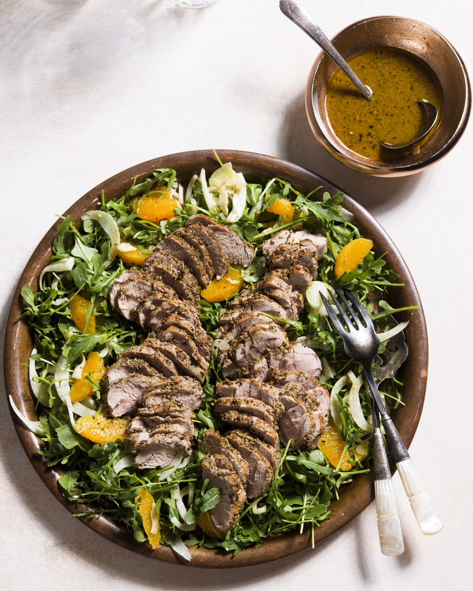 Fennel crusted pork tenderloins orange arugula salad v