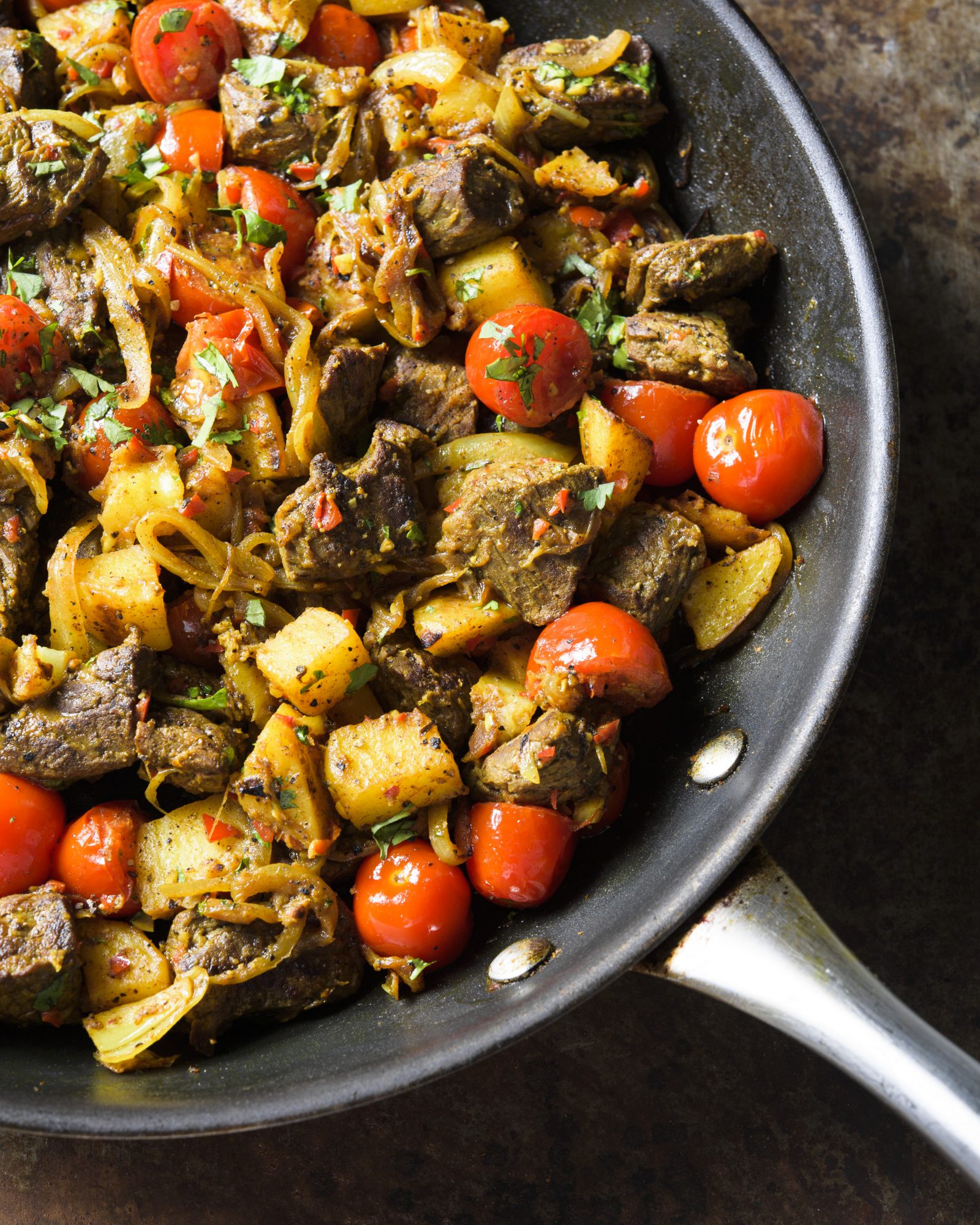 Goan style chili fry beef tomatoes potatoes v