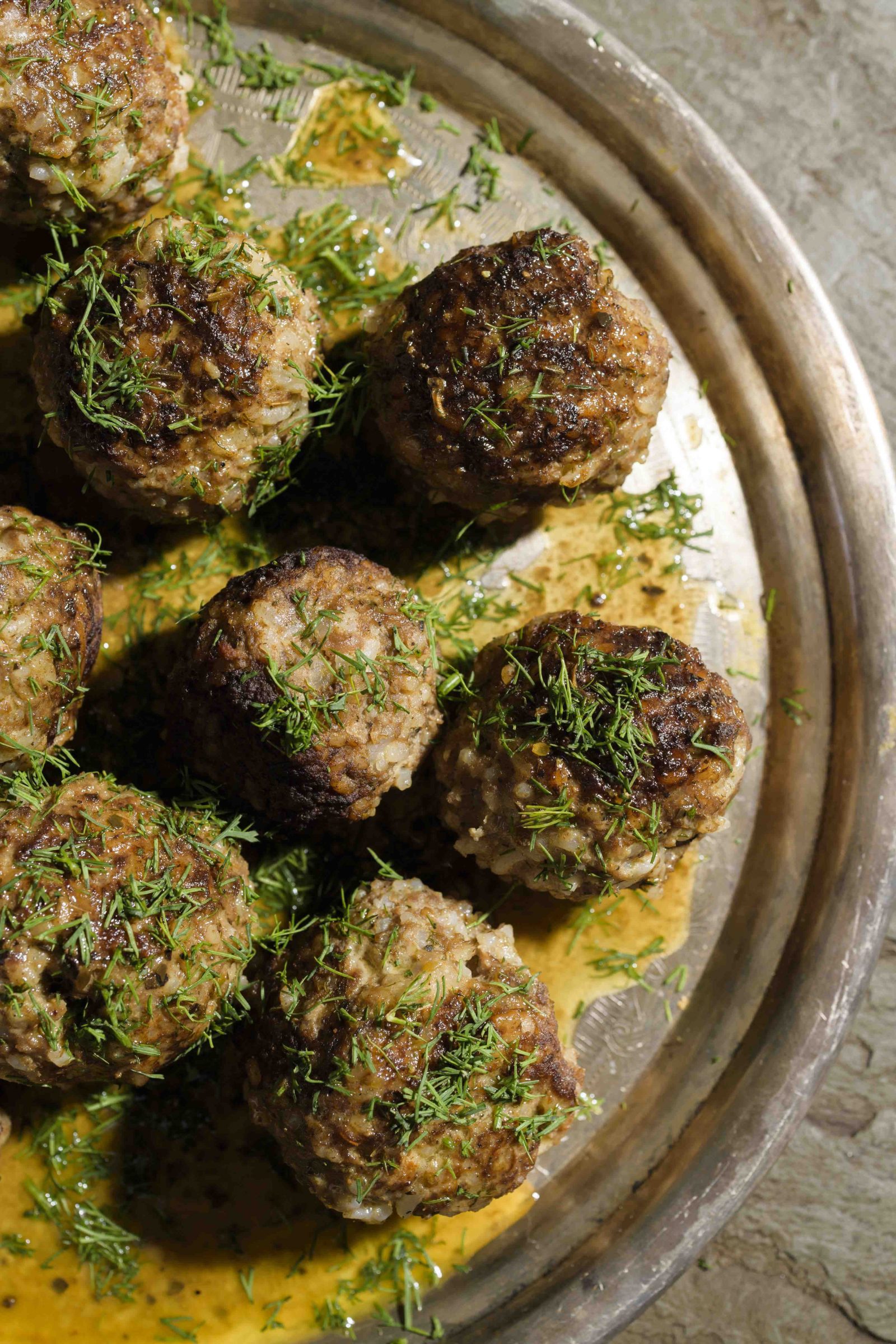 greek-beef-rice-meatballs-lemon-olive-oil-sauce-tn-med