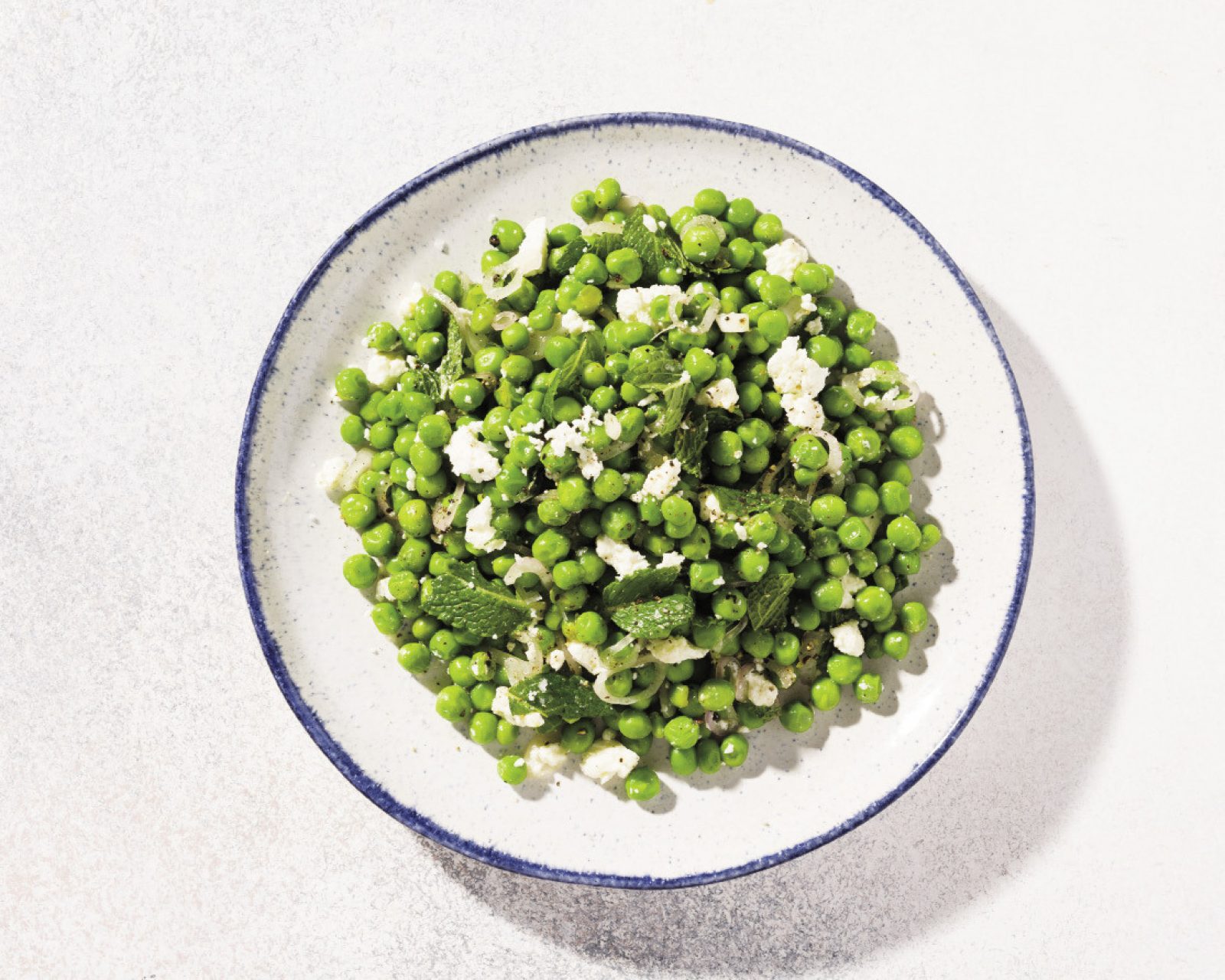 Minty green pea salad lemon feta