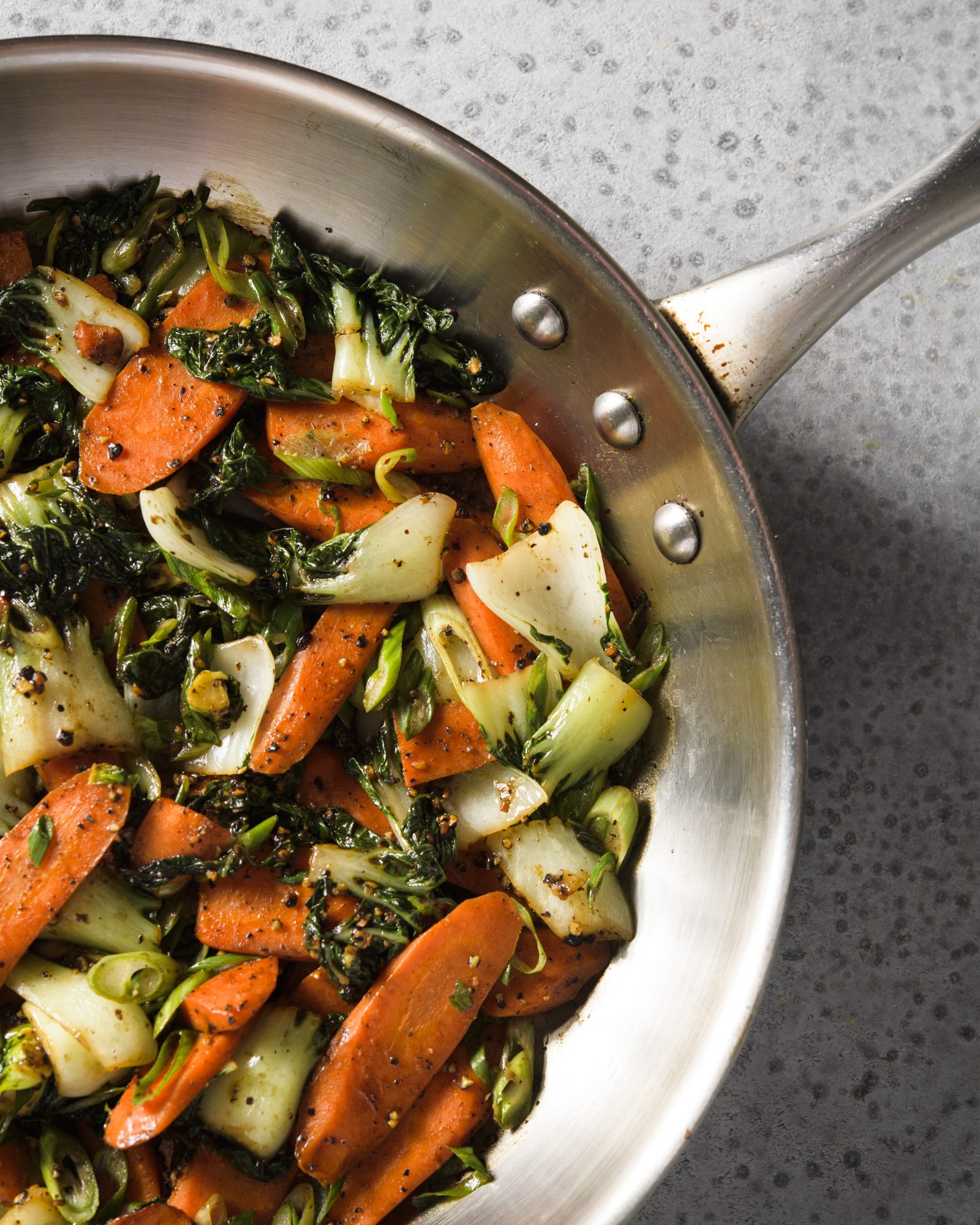 Stir fried carrots bok choy black pepper lime v