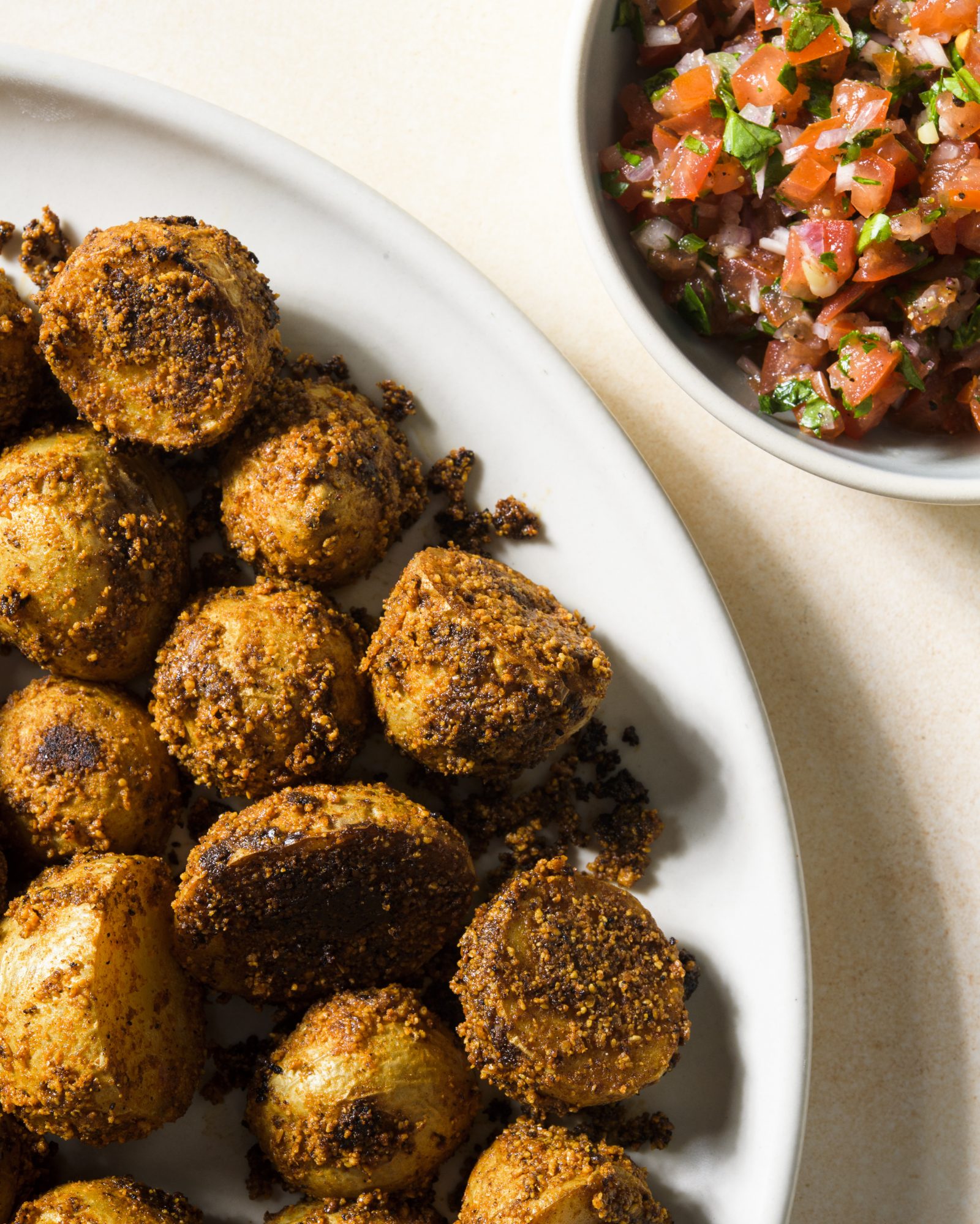 Suya spiced roasted potatoes tomato chili relish v