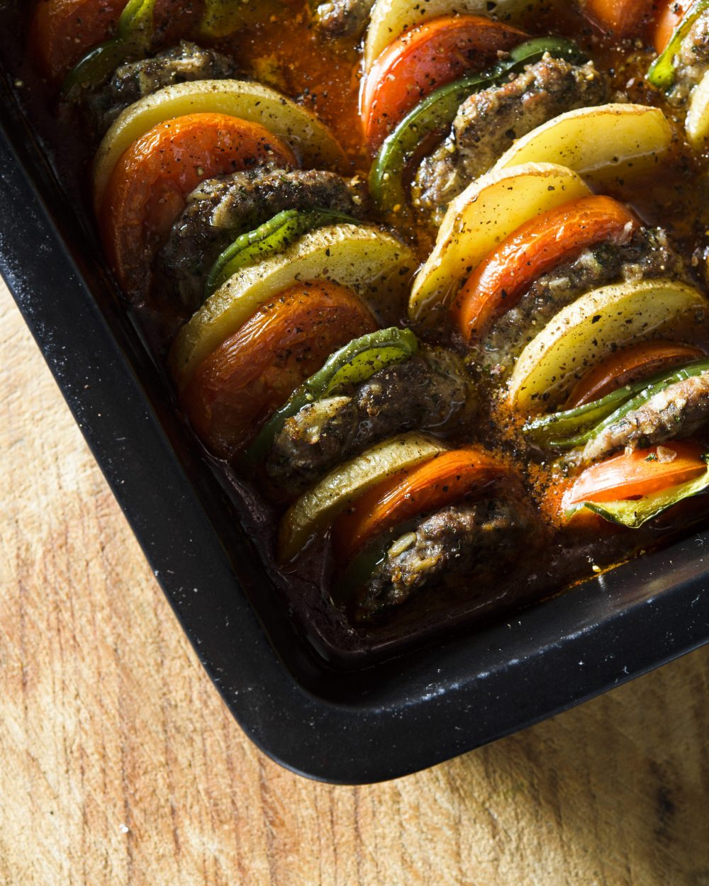 Lebanese baked kafta potatoes tomatoes v
