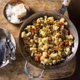 Smothered cauliflower tomatoes capers v