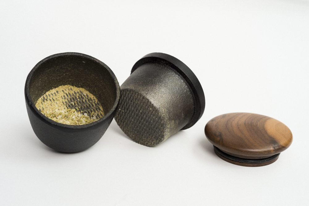 A cast-iron spice grinder can crack, crush or powder small amounts of spice.