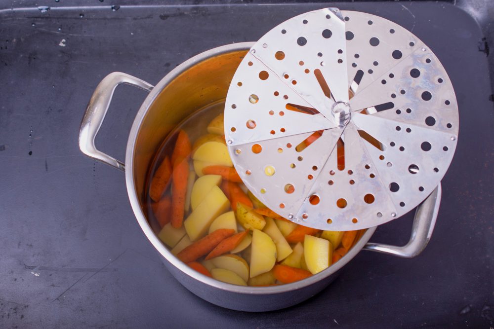 An otoshibuta keeps vegetables submerged.