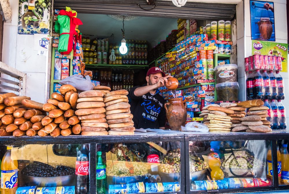 At a second shop, the clerk assembles the tangia.