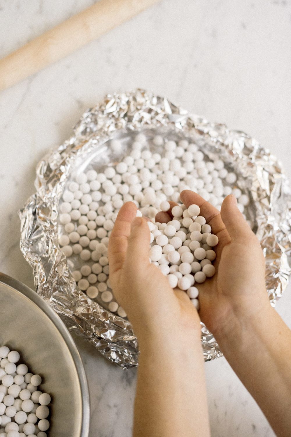 Fill the pie shell a generous three-quarters full with pie weights.