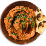 Muhammara gets its rich color from roasted red peppers.